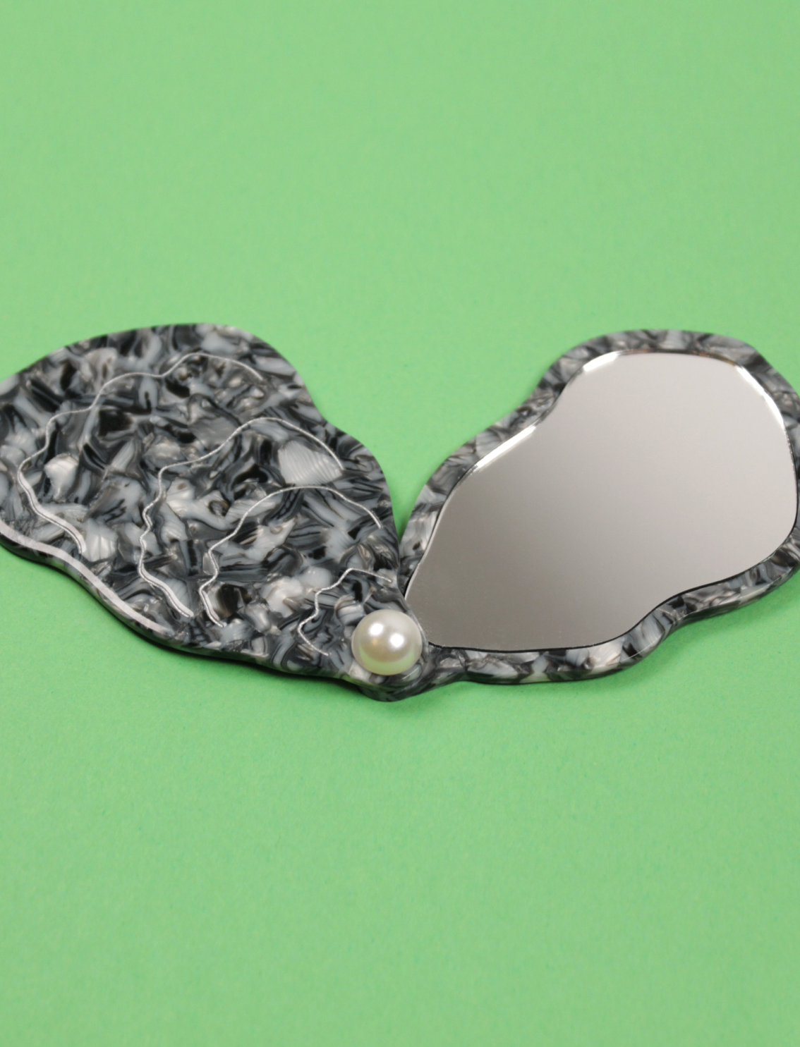 מראת כיס Oyster